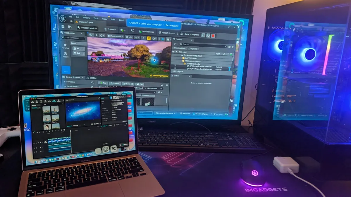 Jess’s workstation with EARTH SCHOOL open in UEFN and a transmission being edited on a laptop